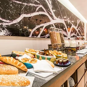 Cosmos 100 Executive Hotel